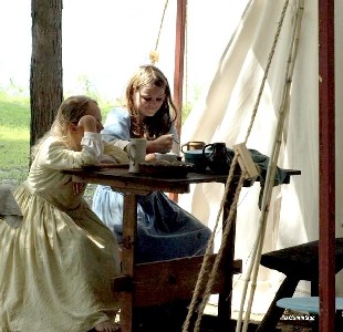 Young girls stitching