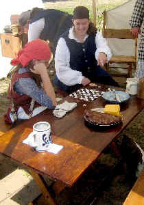 Stephanie Moyer playing checkers