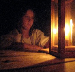 Grace Thatcher staring at lantern in Paynetown
