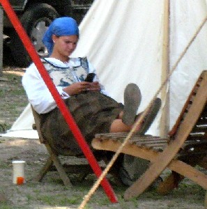 Jen looking at her cell phone