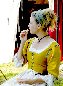 Krista Graves eating an orange