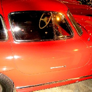 Orange Mercedes 300 SL Gullwing close-up in Auburn Museum