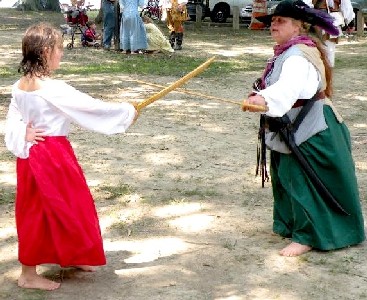 Grace learns swordfighting from Sherilee Hooper
