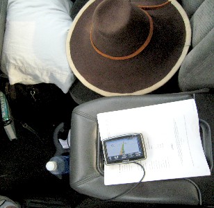the messy front seat of my truck with the Patrick Hand Original hat