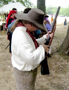 Michael examines action of a gun