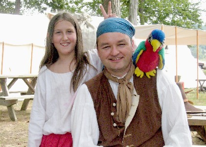 Grace Thatcher and the stuffed parrot I gave her