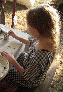 Laurel writing with period ink