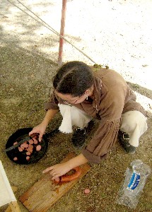Andrea Logsdon making sausage & cabbage