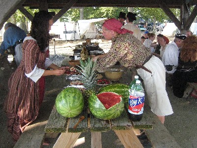 Maia and Suzanne Larner getting food at the pitch-in dinner