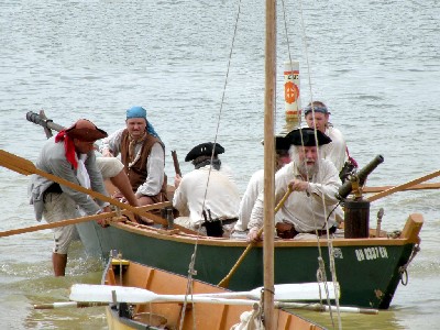 The Black Sheep pulling into shore during battle