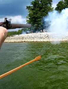 Firing pistols towards land