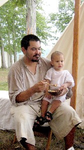 Chad holding his young son Nathaniel