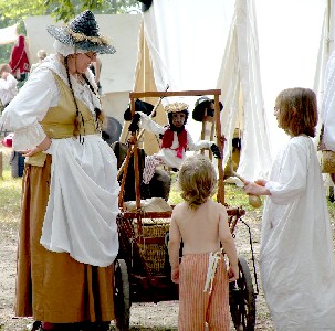 Woman with monkey puppet for kids