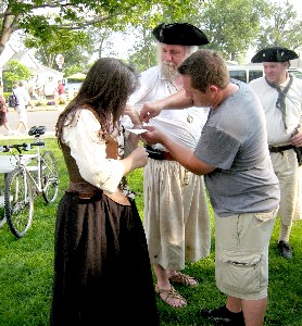 Ty tying on a wrist pass