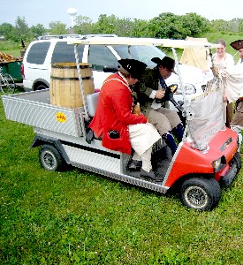 Michael and Jay on the Barneymobile gold cart