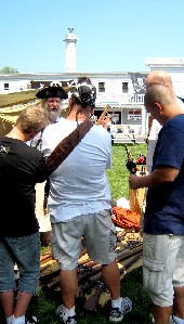 Mark Gist explaining M.A. d'Dogge's weapons