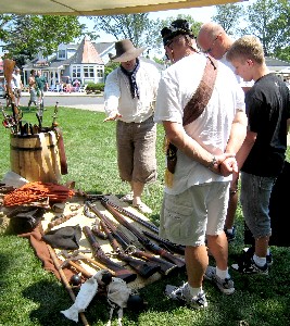 Michael explaining M.A. d'Dogge's weapons