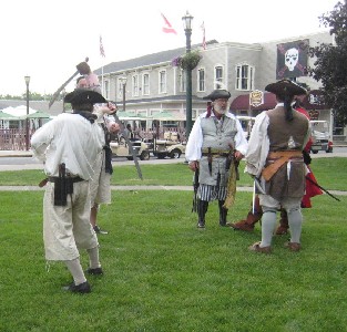 Sam and Jay sword fight in the park