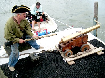 Bob Firing the Cannon with a Stick