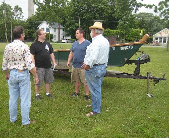 Guys Standing Around Talking, not Setting Up Camp