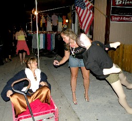 Connie listening to girl with inflatable guy