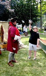 M.A. d'Dogge teaching sword fighting