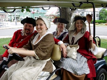 Kate driving folks in the golf cart