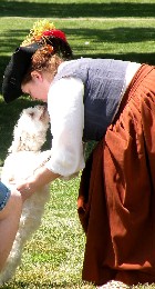 Jennie petting a little dog