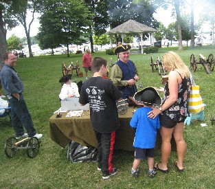 Crowd at Gillmor Armory Table
