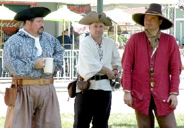Dan, Bryan and Mission standing around
