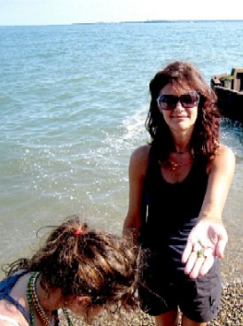 Woman showing us tumbled sea glass