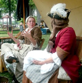 Kate explaining something to Lisa