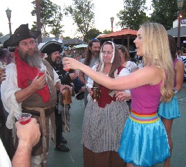 Olive girls 1 handing out free drinks