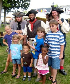 Kids pose with pirates