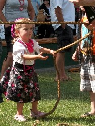 Little girl hauling rope