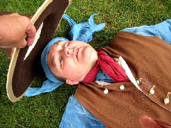 Putting Mission's hat over his face