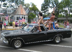 El Camino containing folks in swim suits