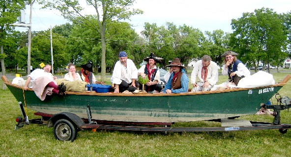 Photo of the pirates in their boat - on land