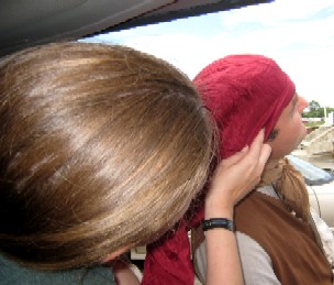 Kate Tying Mission's Scarf