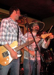 The Fiddle Player with the Patrick Hand Hat