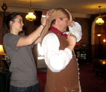 Anes Tying Mission's Head Scarf