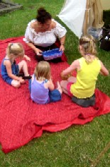 Carla Making Necklaces with Kids