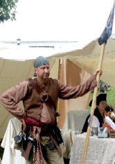 Dave Holding a Pirate Flag