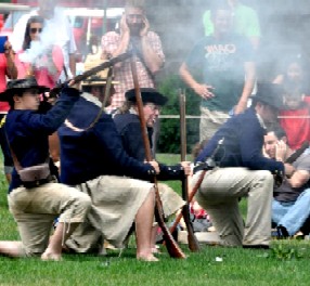 American Defenders with Their Rifles