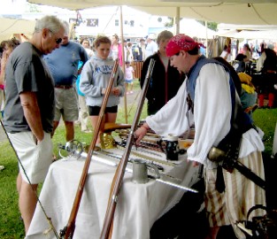 Harrison Pease at the Weapons Table