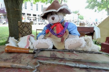 Mission Bear Wearing Beads