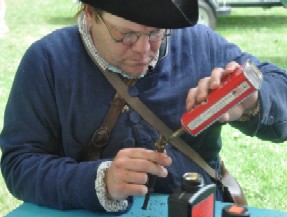Jay Sitting to Load Cartridge
