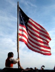 Pip Holding the American Flag