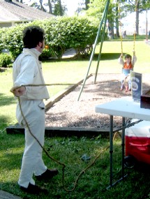 Nathan Pulling Pip on Swing with a Rope
