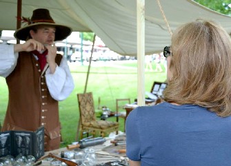 Mission holding his hands up to his mouth